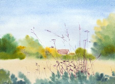 autumn landscape with field and houseの写真素材