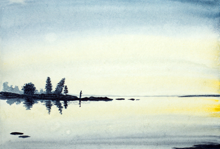 praying monk on the shore of Lake Ladogaの写真素材