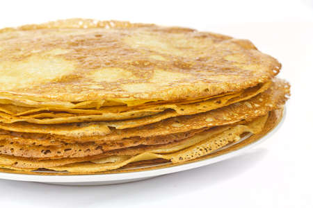 Pancakes in plate on white background 