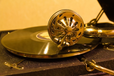 Old gramophone in gold tones の写真素材