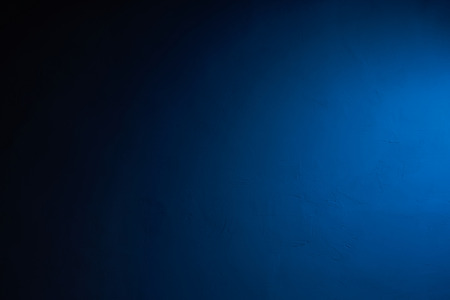 Abstract blue background with visible texture in the backgroundの写真素材