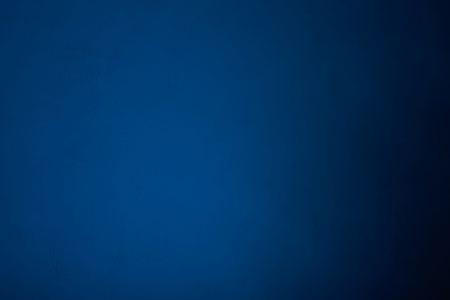 Abstract blue background with visible texture in the backgroundの写真素材