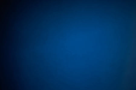 Abstract blue background with visible texture in the backgroundの写真素材
