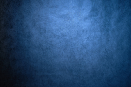 Abstract blue background with visible texture in the backgroundの写真素材