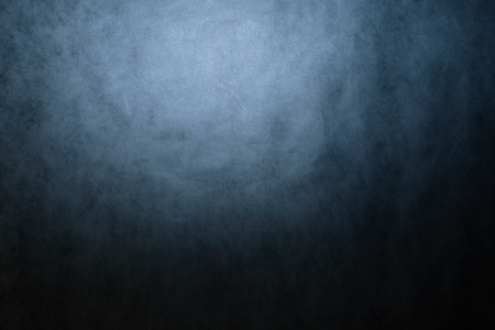 Abstract blue background with visible texture in the backgroundの写真素材