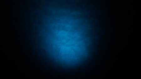 Blue smoke on a black background. Abstract background and texture for design.の写真素材