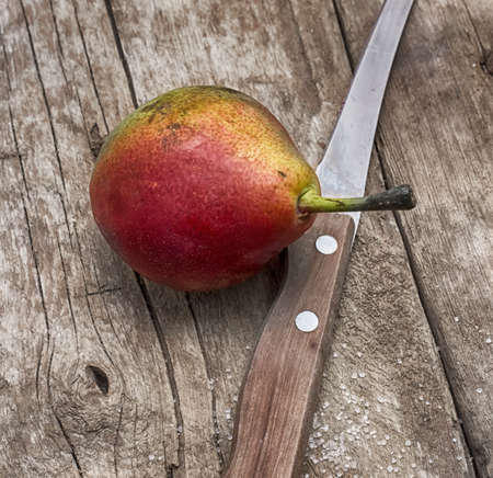 Ripe pears on a wooden backgroundの写真素材
