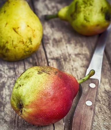 three fragrant pears and knifeの写真素材