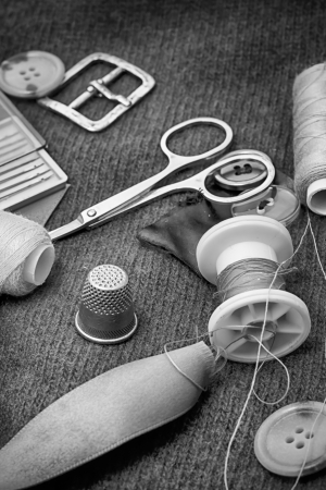 old instruments of repairman clothing  and threadの写真素材
