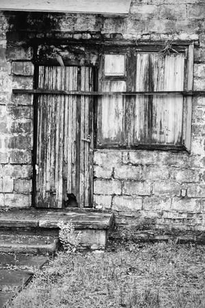 old dilapidated,me a boarded up the house of bricksの写真素材