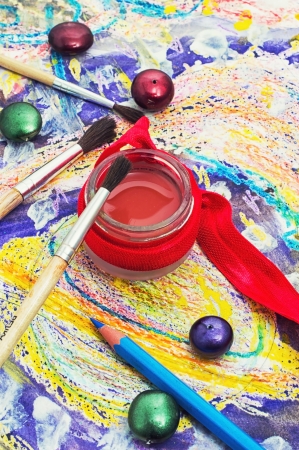 pencils, paint in different colors on the color paletteの写真素材