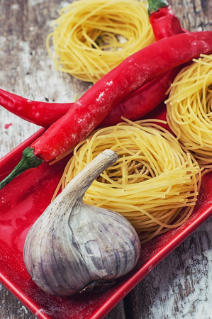 prefabricated tagliatelle pasta with mushrooms and hot spicesの写真素材