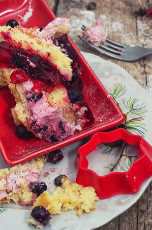 slice of homemade fruit cake with custard and fruitの写真素材