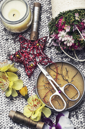 sewing tools and floral decorationsの写真素材