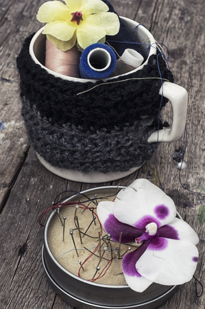 sewing tools and floral decorationsの写真素材