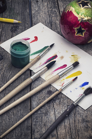 scenery with a set of brushes and paints for paintingの写真素材