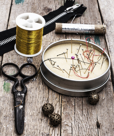 set of old seamstress for needleworkの写真素材