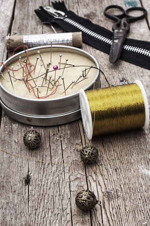 set of old seamstress for needleworkの写真素材