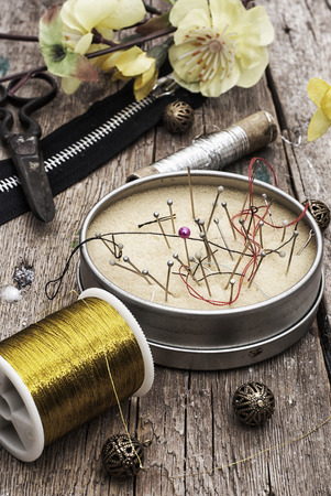 set of old seamstress for needleworkの写真素材