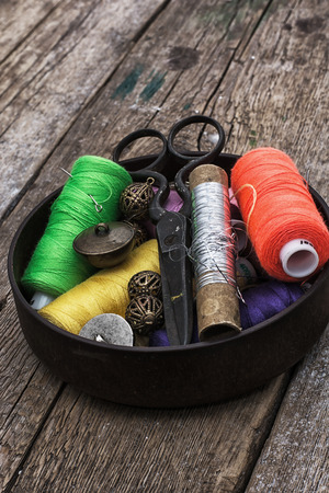 set of old seamstress for needleworkの写真素材