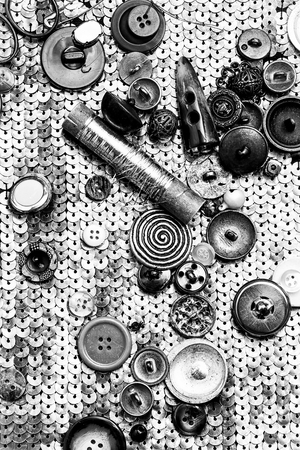 buttons and zipper on the background of sewing toolの写真素材