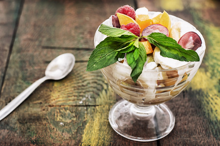 fruit salad is a delicious taste of fresh fruits and berriesの写真素材