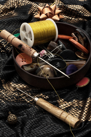 thread,button,crochet hook, and other sewing toolsの写真素材