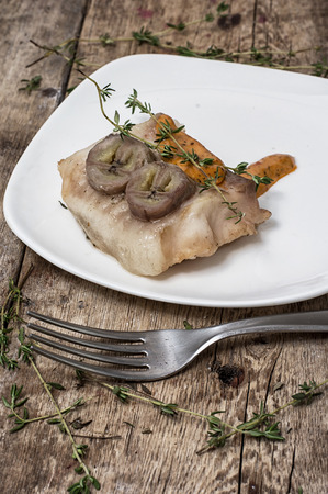 baked fish with banana and with sauceの写真素材