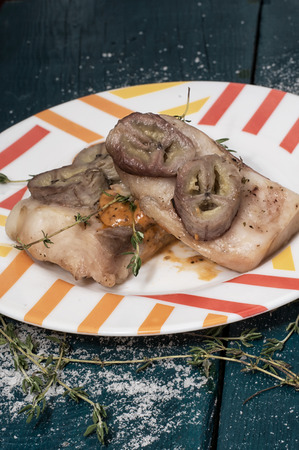 baked fish with banana and with sauceの写真素材