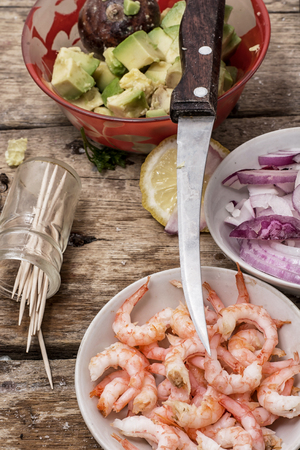 process of preparation of salad with prawns の写真素材