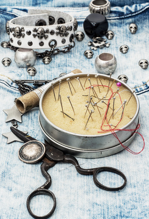 composition with sewing accessories and skull jewelryの写真素材