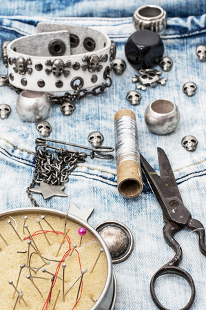 composition with sewing accessories and skull jewelryの写真素材