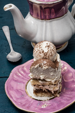 serving coffee cream cake called tiramisuの写真素材