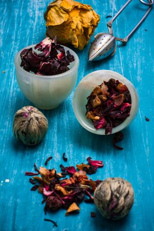 dried tea leaves for brewing tea on wooden tableの写真素材