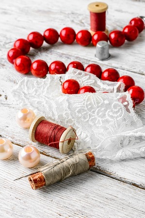 Beautiful items for needlework beads, lace and coral beadsの写真素材