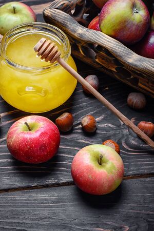Still life with apples and honeyの写真素材
