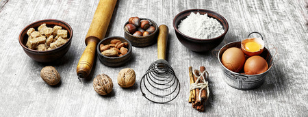 banner with baking ingredients for cooking.Eggs, brown sugar, nut and wheat flour.の写真素材