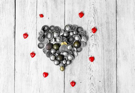 buttons are laid out in the shape of heart for Valentine's dayの写真素材