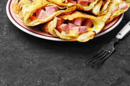 pancakes stuffed with meat on the plateの写真素材