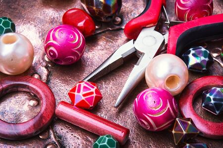 Making of handmade jewellery from colorful beads.Colorful bead heapの写真素材