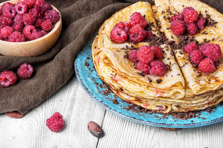 delicious homemade appetizing pancakes stuffed with raspberriesの写真素材