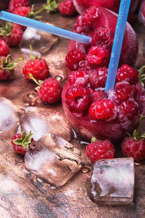 Close up of frozen raspberry juice with iceの写真素材