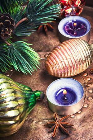 Old-fashioned glass soviet christmas fur-tree toys on a bronze retro background.Christmas holidaysの写真素材