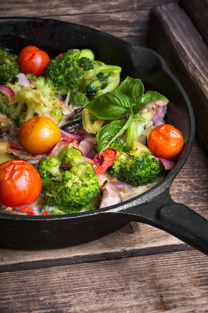 Vegetarian Italian omelette with vegetables in frying panの写真素材