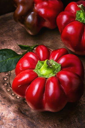Red sweet bell pepper on metal backgroundの写真素材