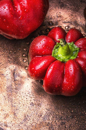 Red sweet bell pepper on metal backgroundの写真素材