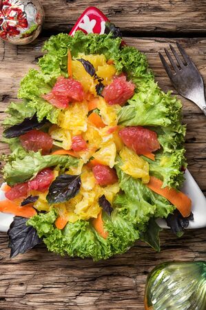 Christmas salad with citrusの写真素材