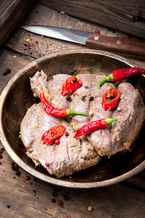 Baked meat steak in chilli pepper and spicesの写真素材