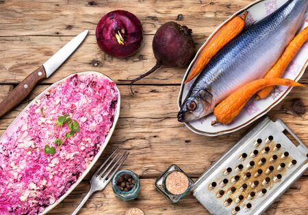 Traditional Russian dish salad with herring, mayonnaise and beetrootの写真素材