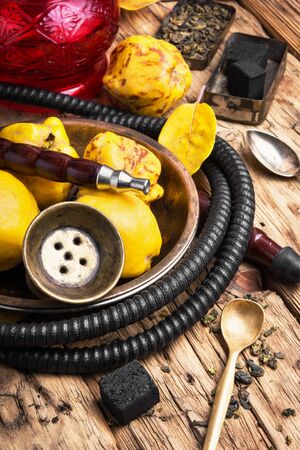 smoking hookah in Arabic style with the tobacco aroma quinceの写真素材